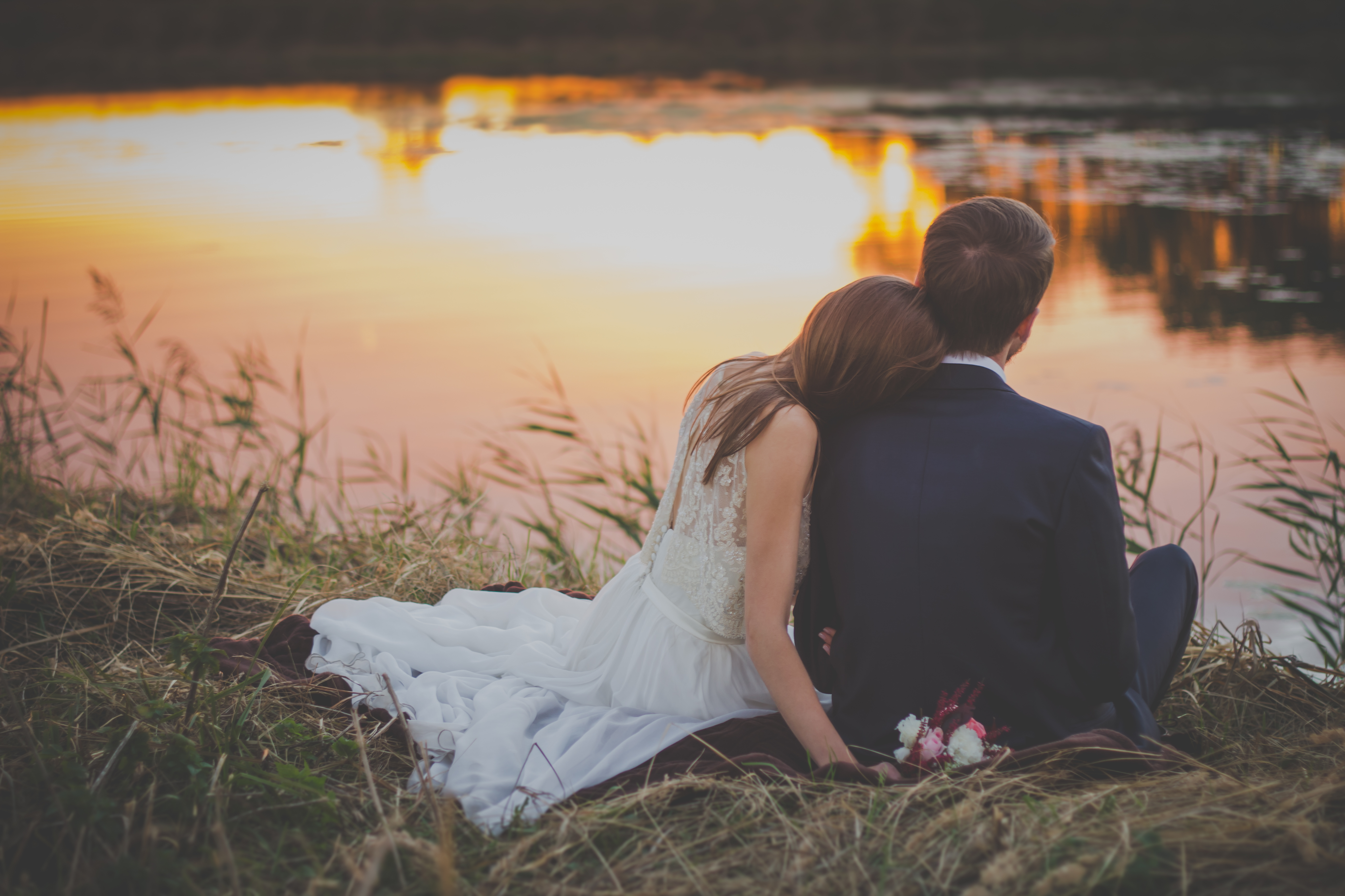 wedding-couple-sitting-on-green-grass-in-front-of-body-of-70737-(1).jpg wedding-couple-sitting-on-green-grass-in-front-of-body-of-70737-(1).jpg